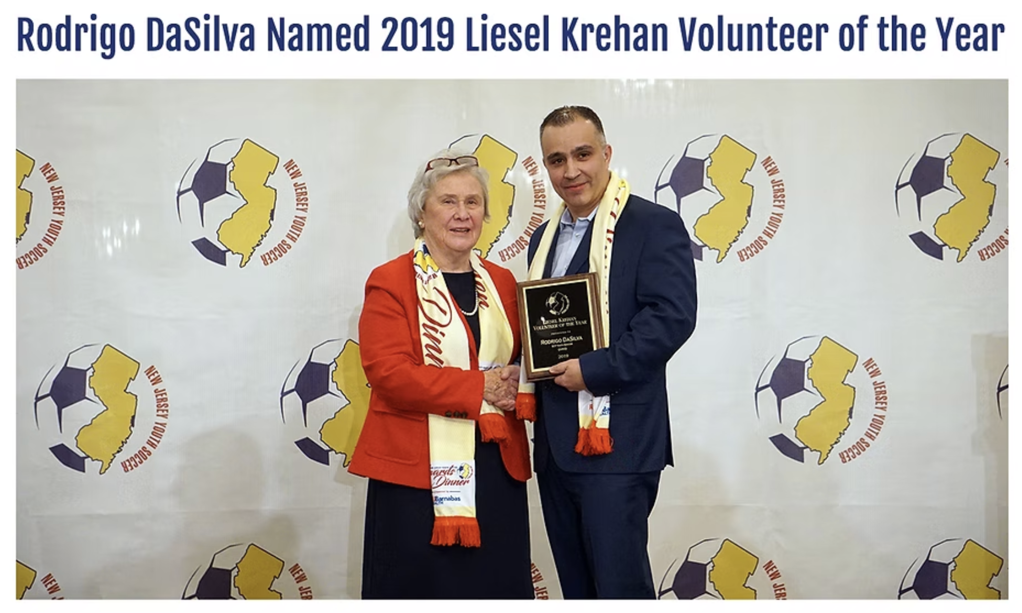 Rodrigo DaSilva accepting the 2019 Liesel Krehan Volunteer of the Year award from NJ Youth Soccer